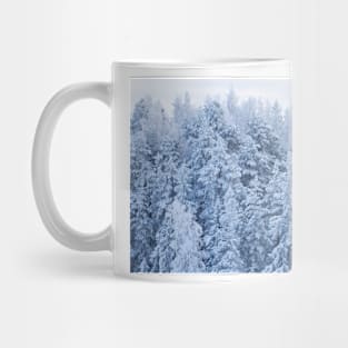 Trees covered in snow Mug